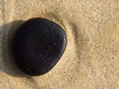 Black Pebble Sandy Beach