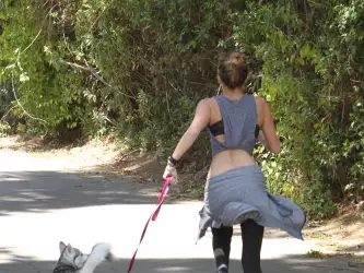 Miley Cyrus Jogging With Her Dog